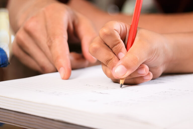 Child working with a tutor