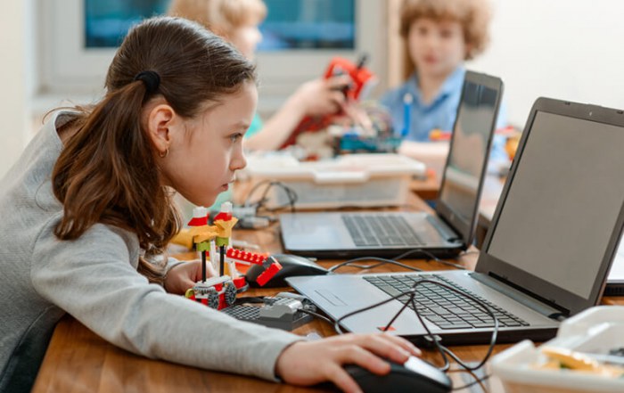 Girl using mathematics for a STEM project
