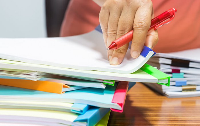 Marking a pile of students' work