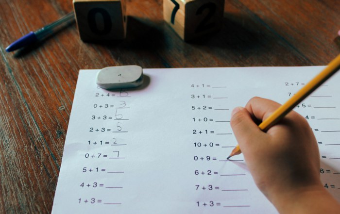 student doing first grade mathematics homework